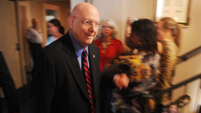 University of Miss Chancellor Dan Jones walks to a press conference at the Lyceum in Oxford, Miss. on Thursday, April 2, 2015.
