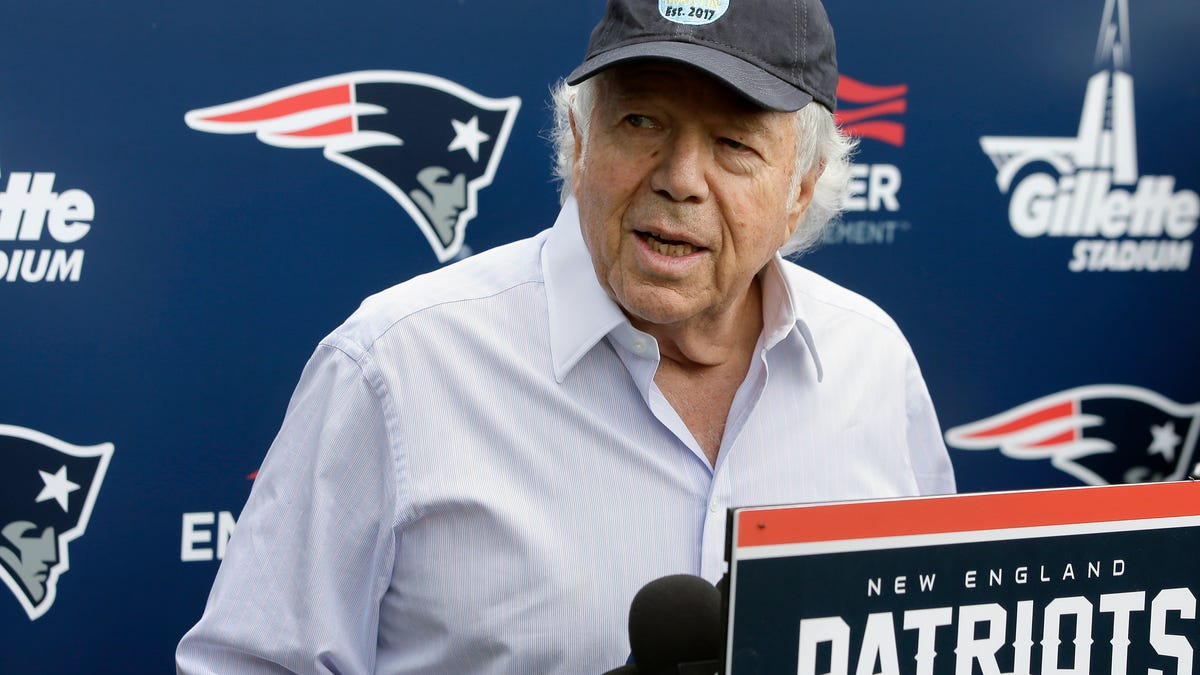 FILE - In this June 7, 2018, file photo, New England Patriots owner Robert Kraft speaks with reporters following an NFL football minicamp practice, in Foxborough, Mass. Police in Florida have charged New England Patriots owner Robert Kraft with misdemeanor solicitation of prostitution, saying they have videotape of him paying for a sex act inside an illicit massage parlor.  Jupiter police told reporters Friday, Feb. 22, 2019,   that the 77-year-old Kraft has not been arrested. (AP Photo/Steven Senne, File)
