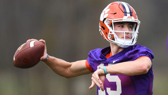 Clemson quarterback Hunter Johnson (15) throws a pass during the Tigers' opening day of spring practice on March 1.
