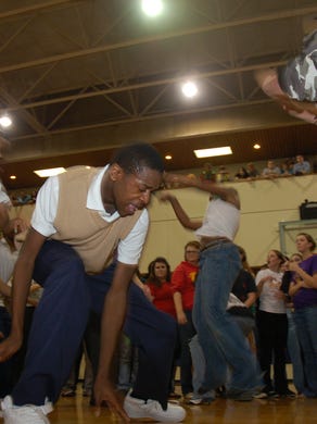 West High School student Adarius Nuby shows his form during free-style dancing before Roane State Academy Festival's award ceremony Friday, April 3, 2009. 