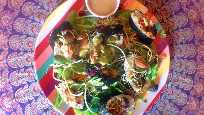 Nori Rolls on a salad with raw sesame dressing is a hot dish at Chef Brooke’s Natural Cafe in Fort Myers.
