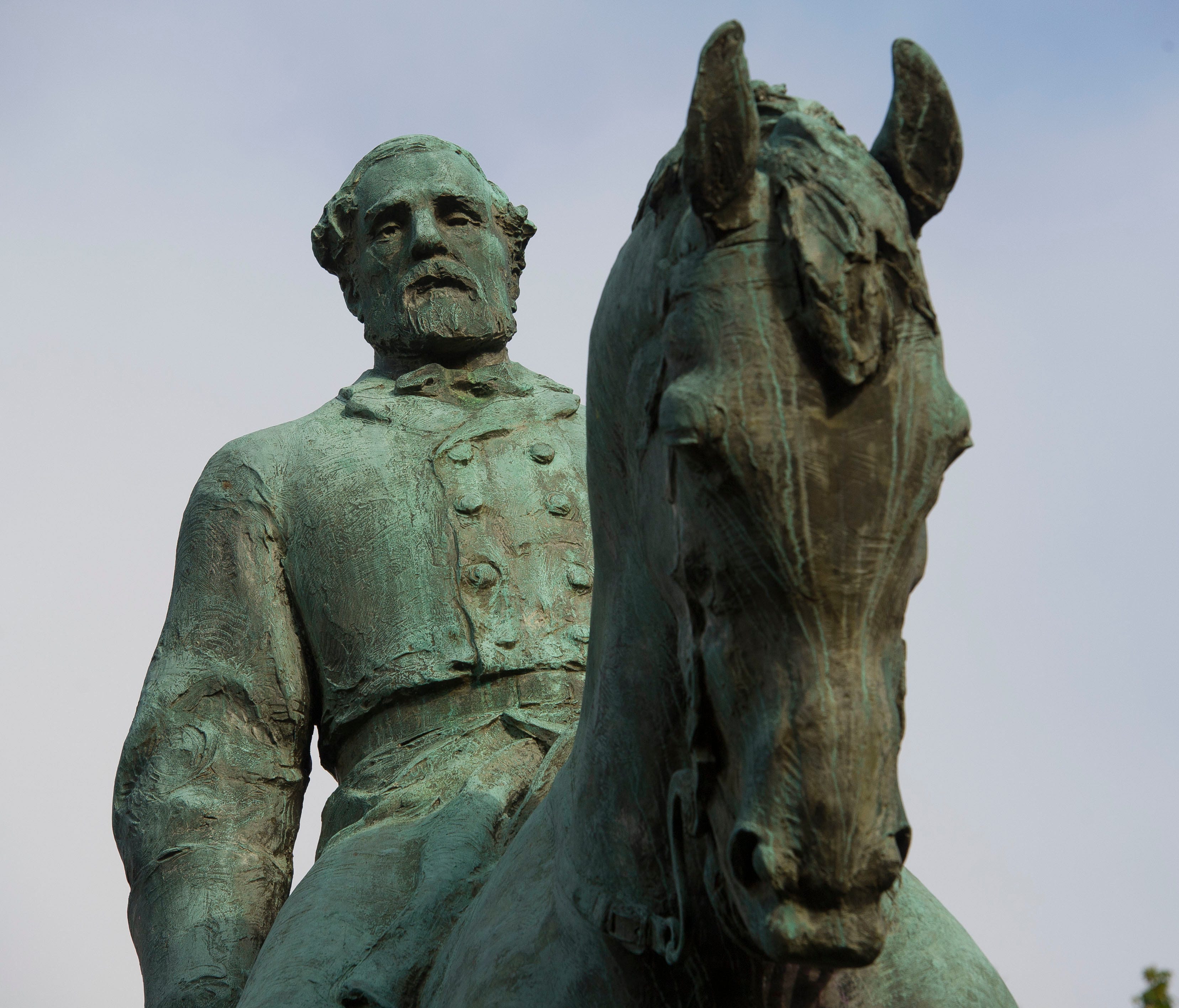 The statue of Robert E. Lee stands in Emancipation Park in Charlottesville, Va., on Aug. 18, 2017.