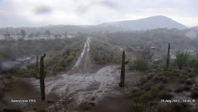 Flooding hit areas of Wickenburg northwest of the Valley Thursday after heavy rains dumped up to 2 inches in some areas.