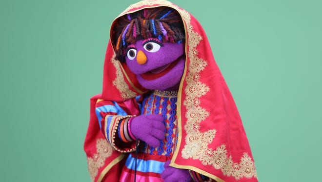 Sesame Street's new Afghan character, a sassy, fun 6-year-old Afghan puppet girl called Zari takes part in a recording session ahead of her television debut on Afghanistan's local production of the show in Kabul, Afghanistan.