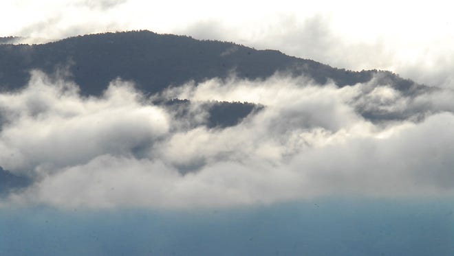 Clouds hang low around  the hills around the Truckee Meadows in 2014.