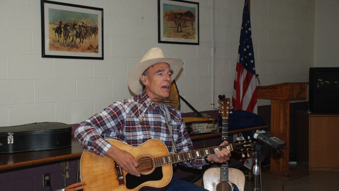 All over New Mexico and across the country, folk singer Steve Cormier, has captured the history of ranching and the open range. He is shown here at Ruidoso Community Center at a potluck hosted by Lincoln County Historical Society.