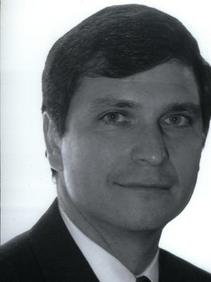 Paul J. Fischer, Executive  Director Michigan Judicial Commission