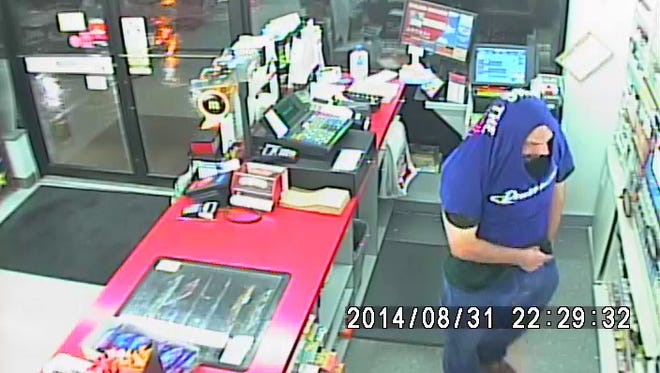 Police are searching for this man, suspected of robbing a convenience store on Aug. 31.