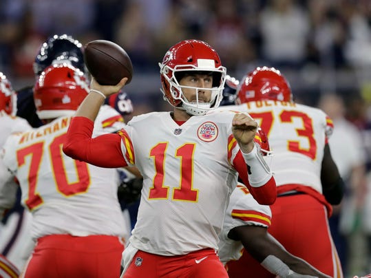 Kansas City Chiefs quarterback Alex Smith (11) throws against the Houston Texans during an NFL football game, Sunday, Oct. 8, 2017, in Houston. (AP Photo/David J. Phillip)