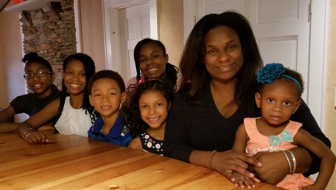 Shala Cromathy and her husband Jason, a retired U.S. Veteran, are the parents of nine children who range in age from one to 23.