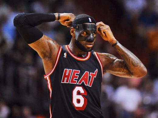 Feb 27, 2014: LeBron James (6) puts on his protective