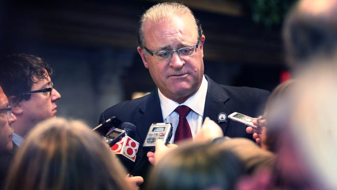 Senate President Pro Tempore David Long, R-Fort Wayne, talks to the news media following Organization Day in the Senate for the 119th Indiana General Assembly at the Indiana Statehouse in Indianapolis on Tuesday, Nov. 18, 2014.