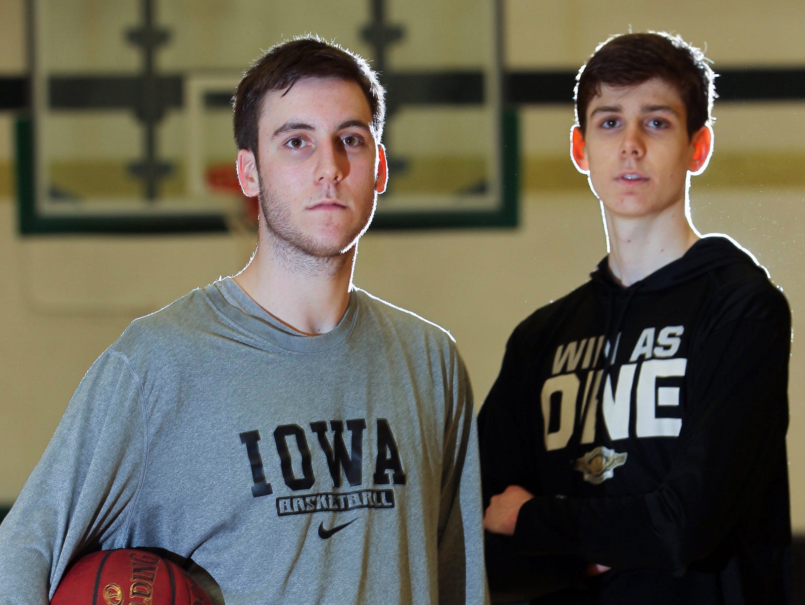 West High's Connor and Patrick McCaffery pose for a photo after practice on Monday, March 6, 2017.
