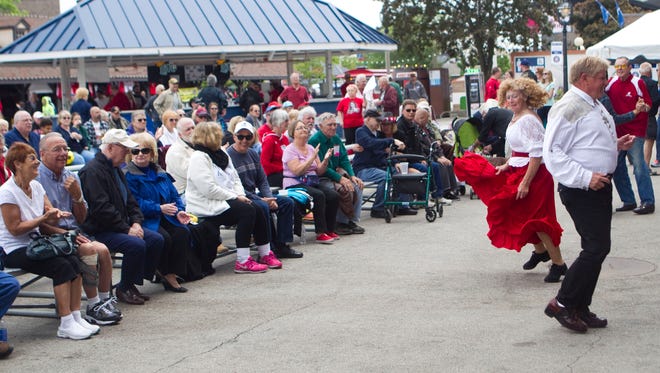 Diane and Robert Macwethy dance the polka for a crowd at Polish Fest in 2015.