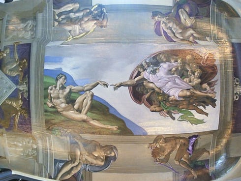 Artist paints Sistine Chapel ceiling inside a Fiat