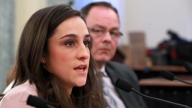 Olympic gymnastics gold medalist Jordyn Wieber testifies before the Senate Commerce, Science and Transportation Committee's Consumer Protection, Product Safety, Insurance and Data Security Subcommittee with fellow abuse victim  Craig Maurizi in the Russell Senate Office Building on Capitol Hill April 18.