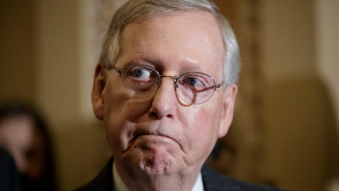 Senate Majority Leader Mitch McConnell of Ky. listens during a news conference on Capitol Hill in Washington, Tuesday, Feb. 7, 2017, after the Senate confirmed Betsy DeVos as education secretary. DeVos was approved by the narrowest of margins, with Vice President Mike Pence breaking a 50-50 tie in a historic vote. (AP Photo/J. Scott Applewhite)