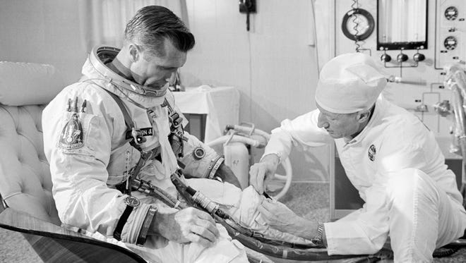Astronaut Richard F. Gordon Jr., pilot of the Gemini-11 spaceflight, undergoes suiting up operations in the Launch Complex 16 suit trailer during the Gemini-11 prelaunch countdown. Later, astronaut Gordon and Charles Conrad Jr., command pilot, entered a transport van which carried them to Pad 19 and their waiting spacecraft. Liftoff was at 9:42 a.m. on Sept. 12, 1966.