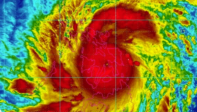 Typhoon Haiyan strikes the Philippines on Nov. 8, 2013.