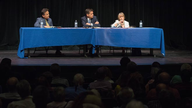 New Mexico gubernatorial candidates Jeff Apodaca, left, Joe Cervantes, center, and Michelle Lujan-Grisham, introduce themselves during the 2018 Democratic Party of Doña Ana County Forum at the Rio Grande Theatre, Tuesday, May 1, 2018. The forum is a three-day event, with candidates in federal, state and county races slated to speak Wednesday May 2, and Wednesday, May 9, all at the Rio Grande Theatre. Republican Steve Pearce is also running for governor. The primary election is June 5 and the general election is Nov. 6.