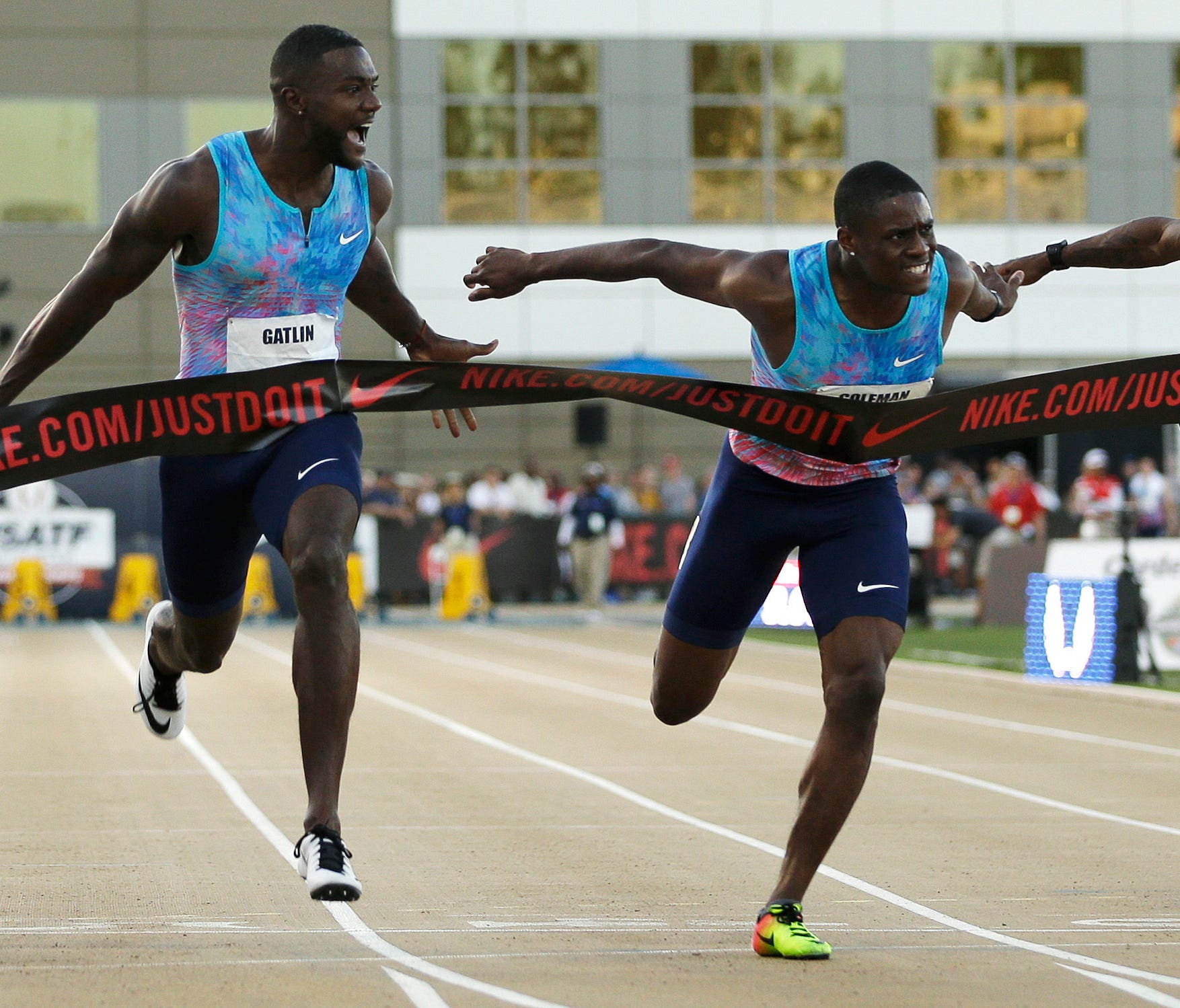 Justin Gatlin, left, edges Christian Coleman in the 100 final at the U.S. championships in Sacramento on Friday.
