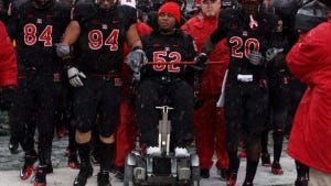 Eric LeGrand (52) challenged former Rutgers teammate and close friend Khaseem (Eric LeGrand (52) challenged former Rutgers teammate and close friend Khaseem Grene (20) to the ALS Ice Bucket Challenge. (File photo)