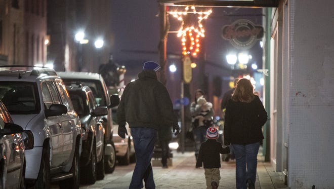 First Thursday brought Light Up DWNTWN and several art galleries to downtown Muncie in 2015.