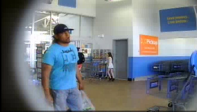 Washoe County Sheriff's Office obtained security photos of a man who allegedly used a stolen credit card to make purchases late last month. Authorities are searching for the man.