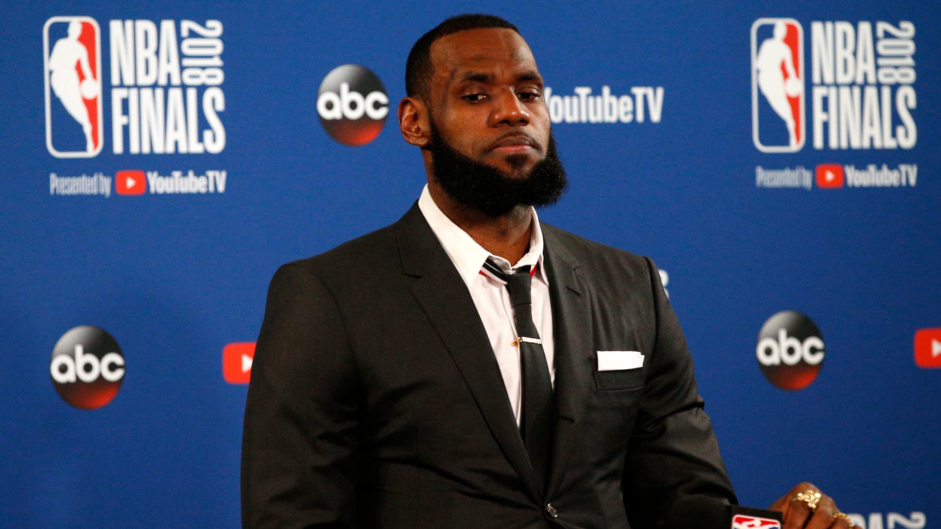 Watch LeBron James bolt from press conference after J.R ...