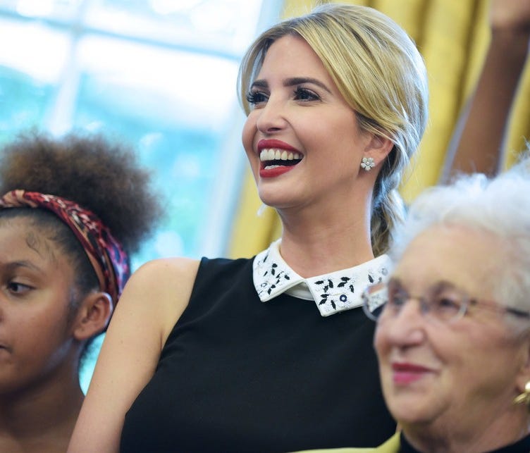Ivanka Trump smiles during a ceremony before US President Donald Trump signed a memorandum on increasing access to science, technology, engineering and mathematics education in the Oval Office of the White House on September 25, 2017 in Washington, D