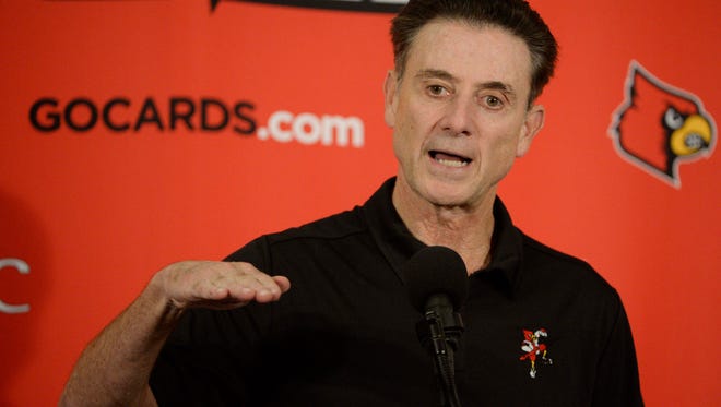 Louisville Cardinals head coach Rick Pitino talks to the media following a scrimmage at KFC YUM! Center on Oct. 3.