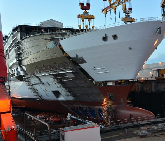 A photo taken in March 2017 shows the bow of Royal Caribbean's Symphony of the Seas being moved into position during the vessel's construction. Symphony will be the world's largest cruise ship when it debuts in April 2018.