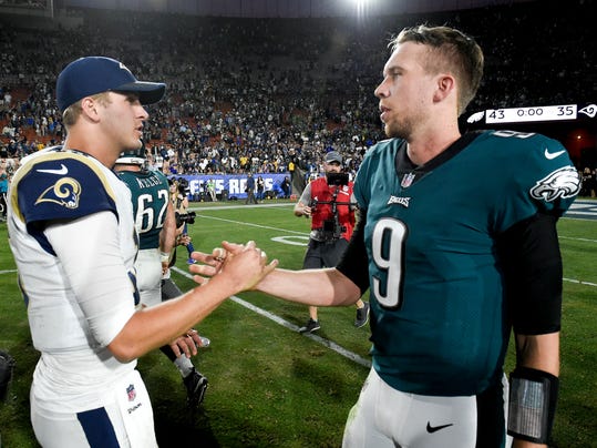 Philadelphia Eagles quarterback Nick Foles, right, greets Los Angeles Rams quarterback Jared Goff after the Eagles win during an NFL football game Sunday, Dec. 10, 2017, in Los Angeles. (AP Photo/Kelvin Kuo)