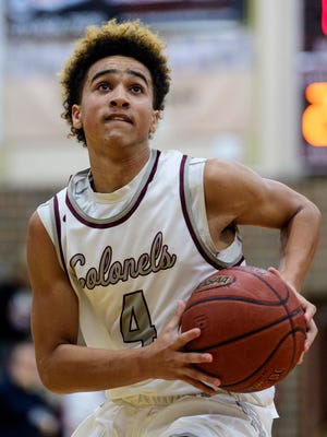 Kale Gaither scored 13 points and grabbed a team-high eight rebounds in Henderson County's 68-44 win over Day School on Friday at Colonel Gym.