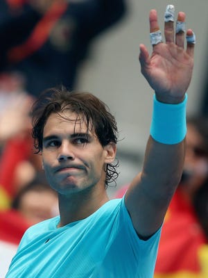 Rafael Nadal of Spain gestures following his win against Tomas Berdych of the Czech Republic. The win assured that Nadal will return to No. 1 in the rankings.