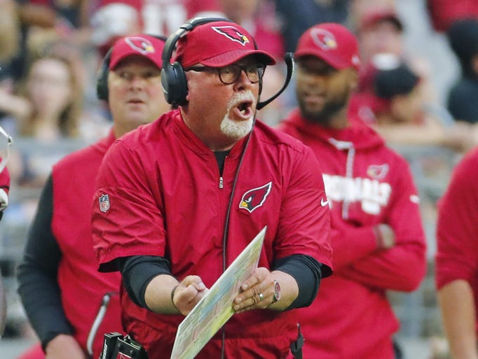 Arizona Cardinals head coach Bruce Arians argues a