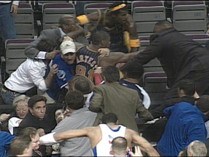 Ron Artest is in the thick of the fight as Palace security