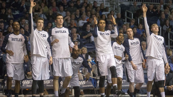Butler players celebrate a three pointer as Butler beat Virginia Military Institute 93-66, at Hinkle Fieldhouse, Indianapolis, Monday, Dec. 7, 2015.