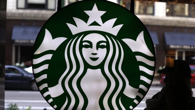 Starbucks logo is seen at one of the company's coffee shops in downtown Chicago.