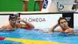 Michael Phelps (USA) and Ryan Lochte (USA) react after