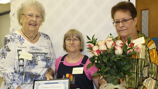 Gretel Fischer (left) is named Fairview fce 2016 Best of the Best by club officers Barbara Comer and Winnie Decker.