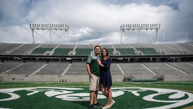 CSU graduates Kyle Griffin and Laura Krause got engaged, with the help of an engraved brick at the university's new stadium, on Saturday.
