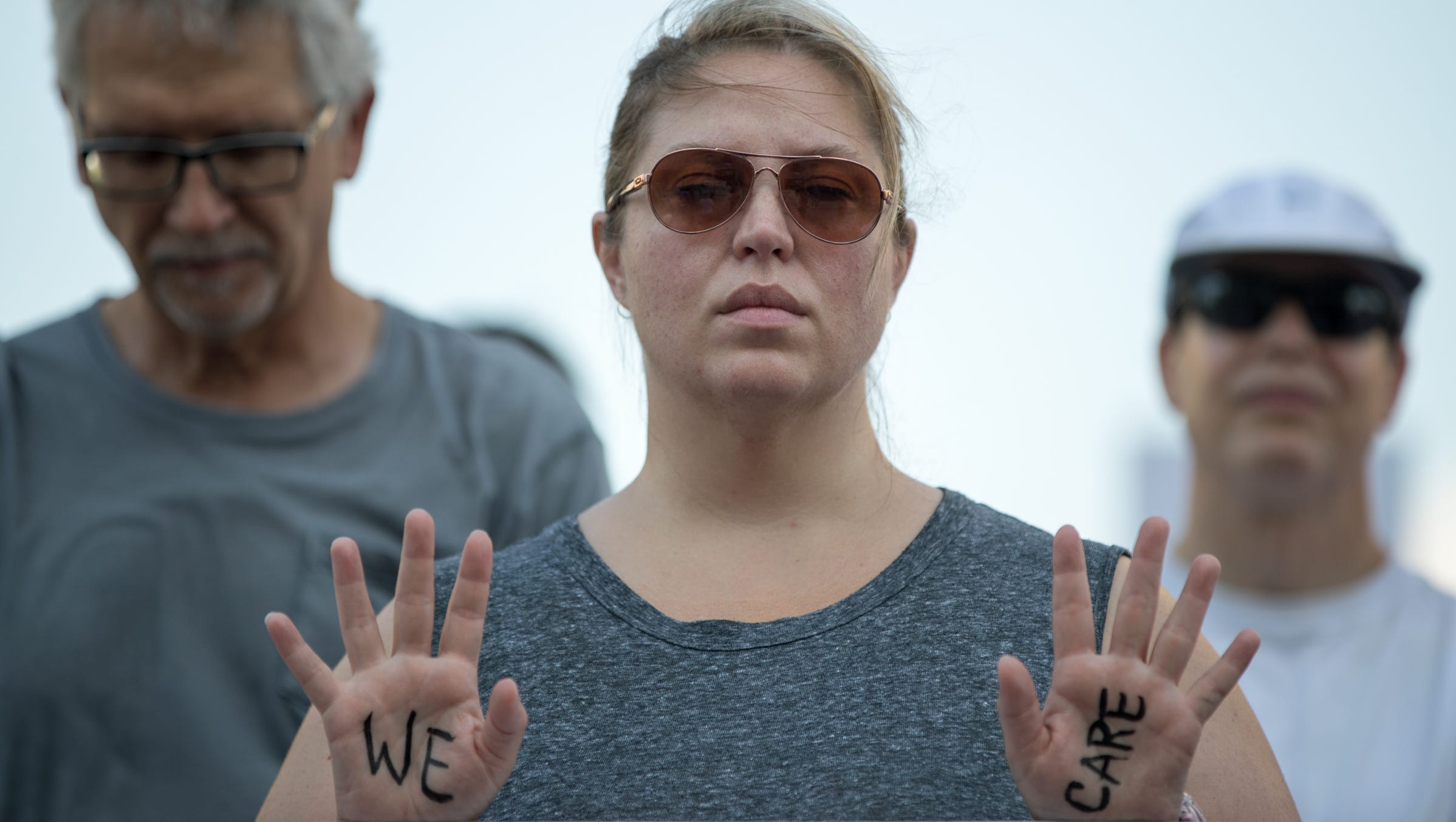 Jennifer Mayer, Zionsville, Ind., stands with a crowd