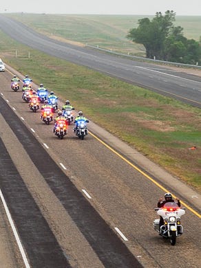 Dumas Police Chief Marvin Trejo's funeral procession was over a mile long at some points on the 55-mile trip from Dumas to Memory Gardens Cemetery in Amarillo. His was the ninth COVID-19 death in Moore County.