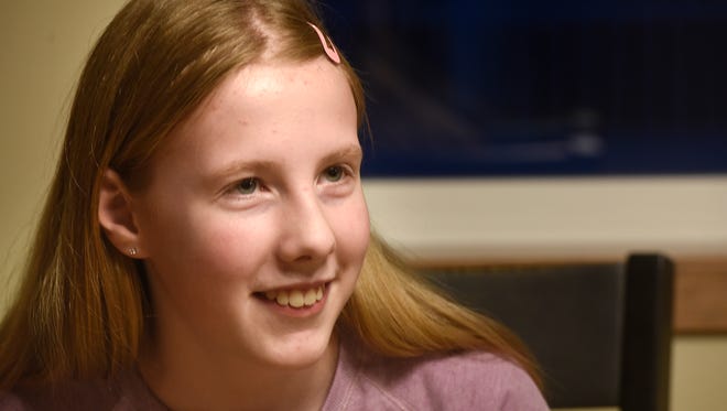 Lydia Johnson talks about her experience in the Central Minnesota Regional Spelling Bee during an interview at her home Wednesday, Feb. 7, in Sauk Rapids. 