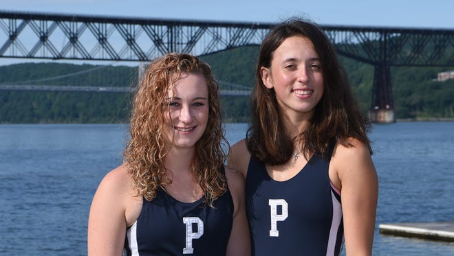 Devin Tully, left, 18, and Fiona Mauer, right, 17, both from the City of Poughkeepsie and graduates of Poughkeepsie High School, pose on the Hudson River. They make up the Girls Crew Boat of the Year.