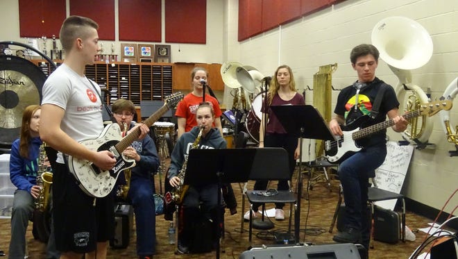 The Bucyrus X Band practices Wednesday before its big competition Saturday at the Rock and Roll Hall of Fame.