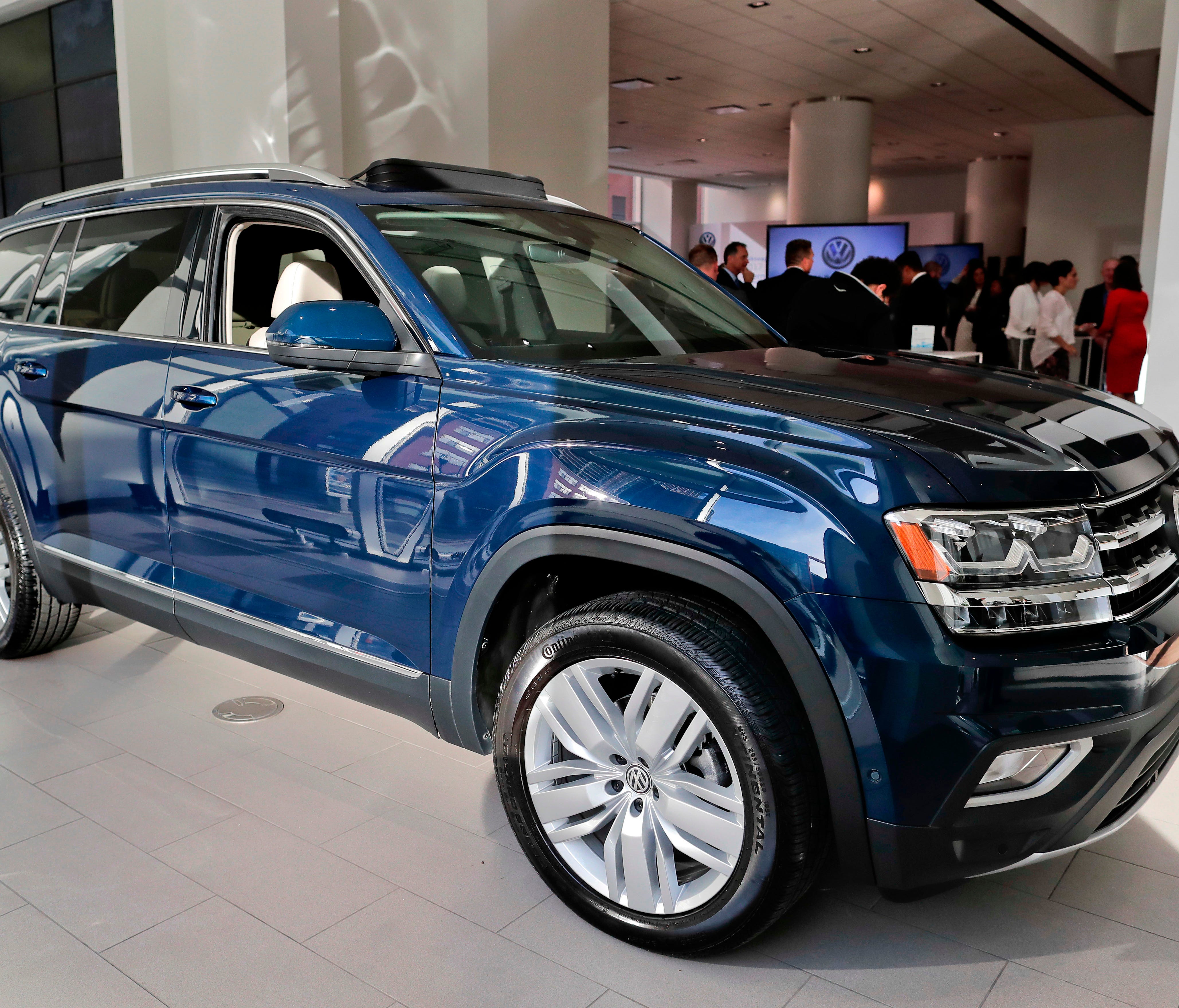 The 2018 Volkswagen Atlas sits on the showroom floor at the company's New York flagship store during a media preview for the New York International Auto Show in New York. Starting with the 2018 model year, Volkswagen offers a six-year or 72,000-mile 