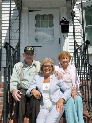 Rep. Diane Black with her parents, Audrey and Joe Warren, 90, outside the 1,000-square-foot Maryland home where Black was raised. Her parents still live there.