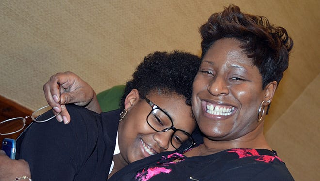 Iyanla Thomas, 14, of Jackson, a member of the Boys & Girls Clubs of Central MS Capitol Unit, receives a hug from BGCCM President/CEO Penney Ainsworth after Thomas was named BGCCM Youth of the Year during 2017 Youth of the Year Competition held Tuesday.